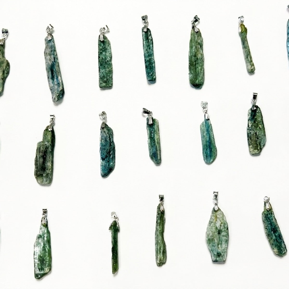 "One Like None green kyanite pendants"